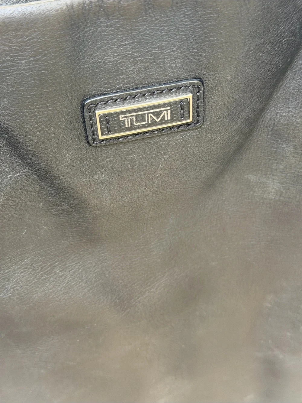 Tumi Black 100% Leather Tote Bag with padded laptop sleeve